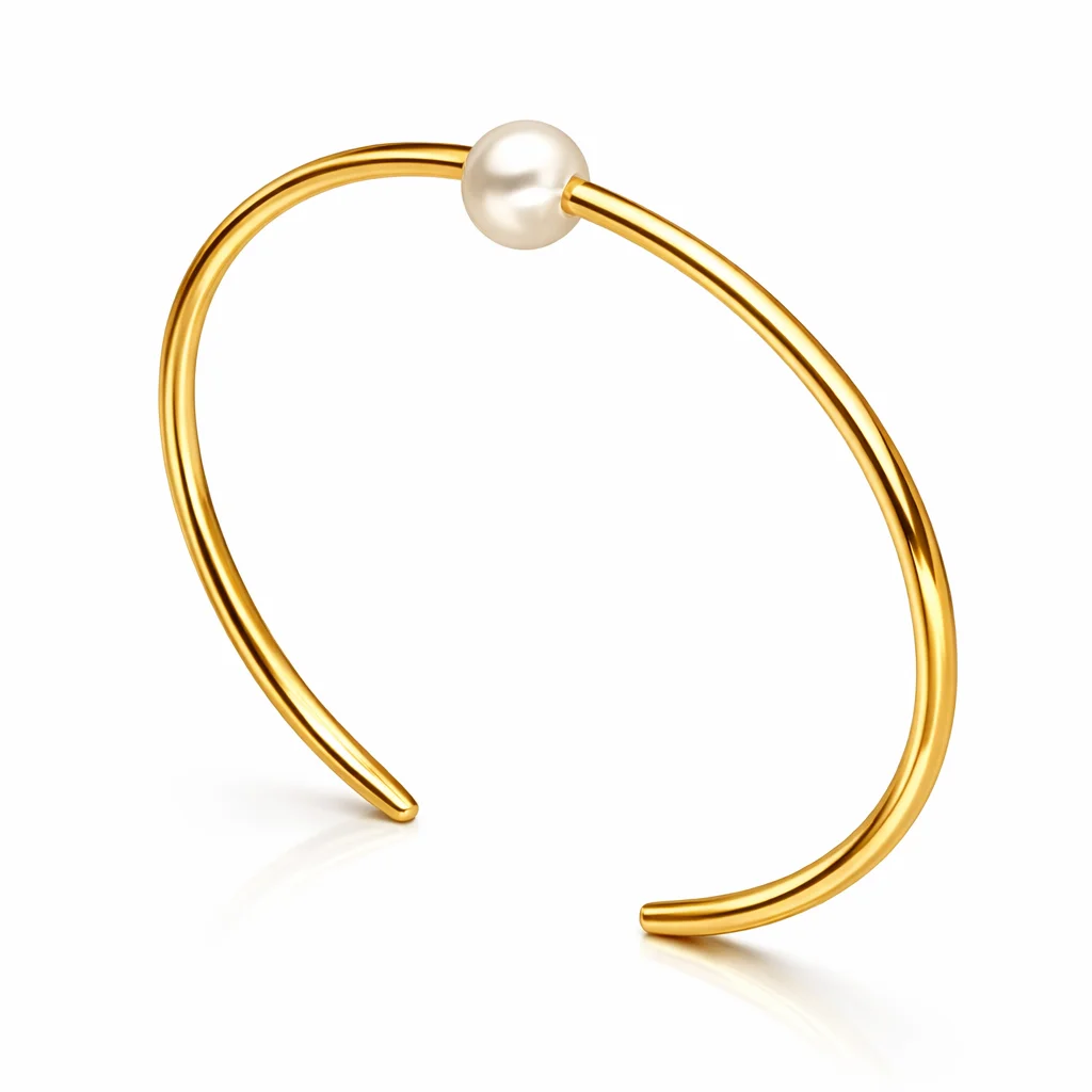 Bransoletka pozłacana sztywna z perłą